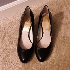 Michael Kors Black patent leather heels.
